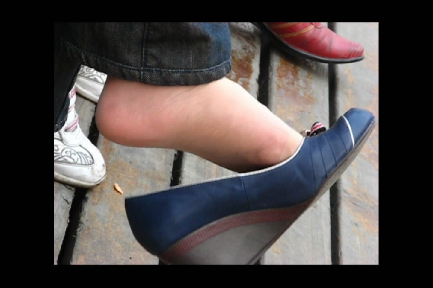 Girl dangling blue platform